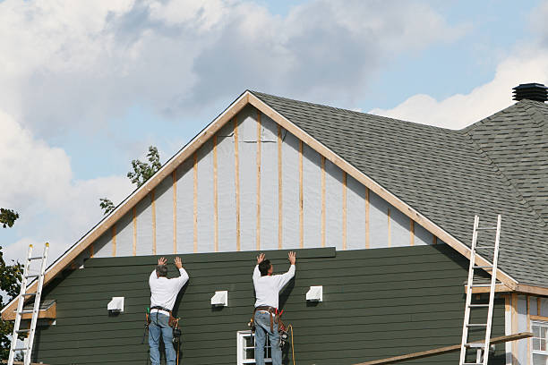 Professional Siding Installation technician working in Saint Augustine, FL